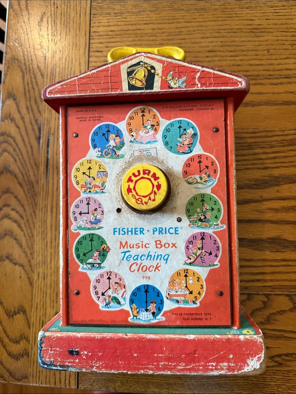Fisher-Price Red and Yellow Schoolhouse Clock Toy with Blue Dial